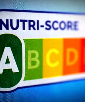 Nutri-Score label displaying grades A to E in a colorful format on a blue background. - Olive Oil Times