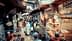 A bustling market scene in a traditional bazaar with various stalls and shoppers. - Olive Oil Times