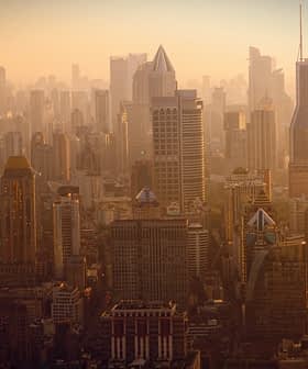 A panoramic view of Shanghai's skyline with skyscrapers during sunset. - Olive Oil Times