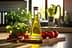 Glass bottle of olive oil surrounded by fresh tomatoes and basil on a wooden cutting board. - Olive Oil Times