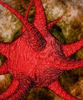 Illustration of a red virus with spiky protrusions against a textured background. - Olive Oil Times